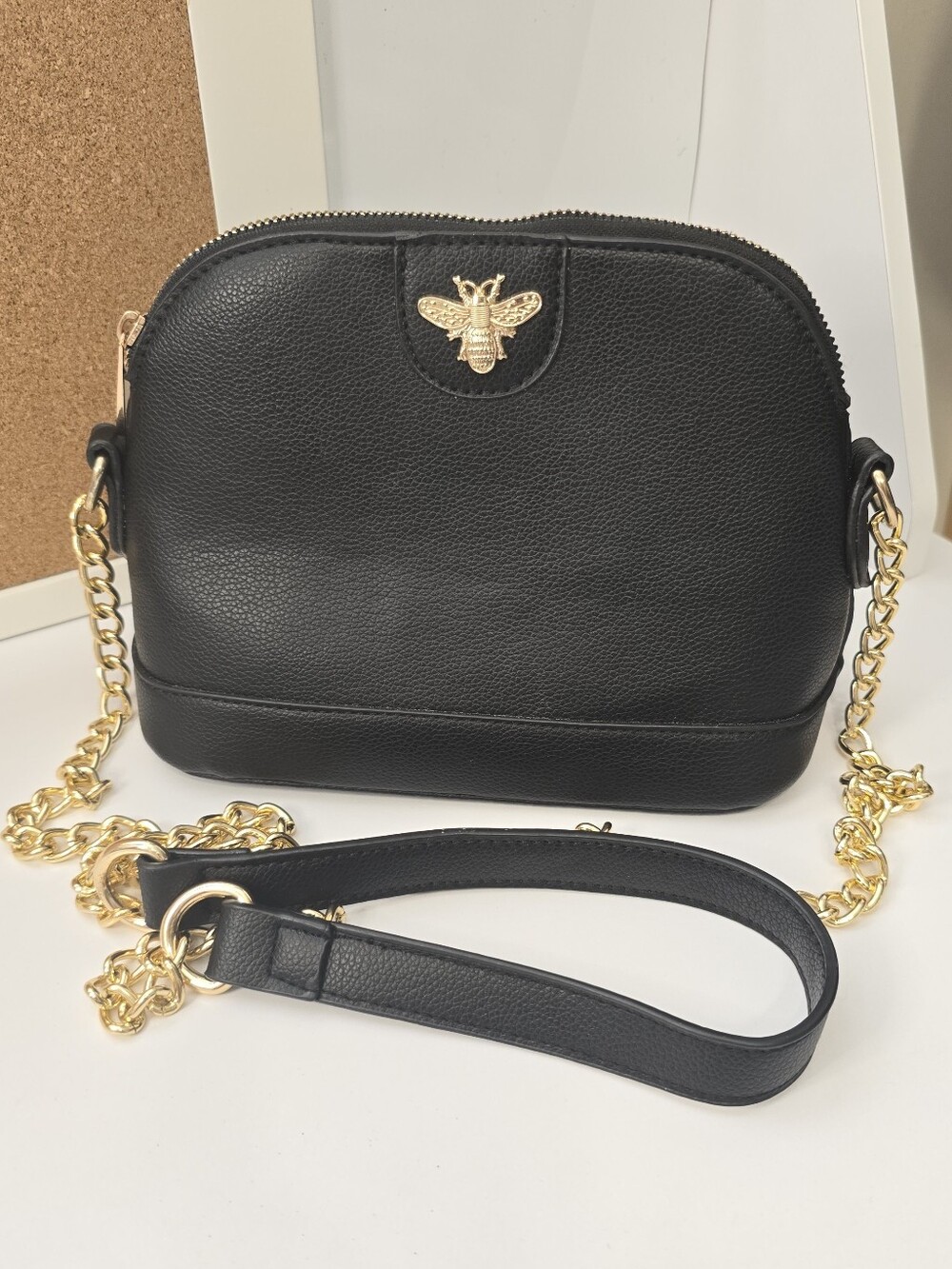 Textured Black Dome Crossbody Bag with Gold Bee Accent and Chain Strap